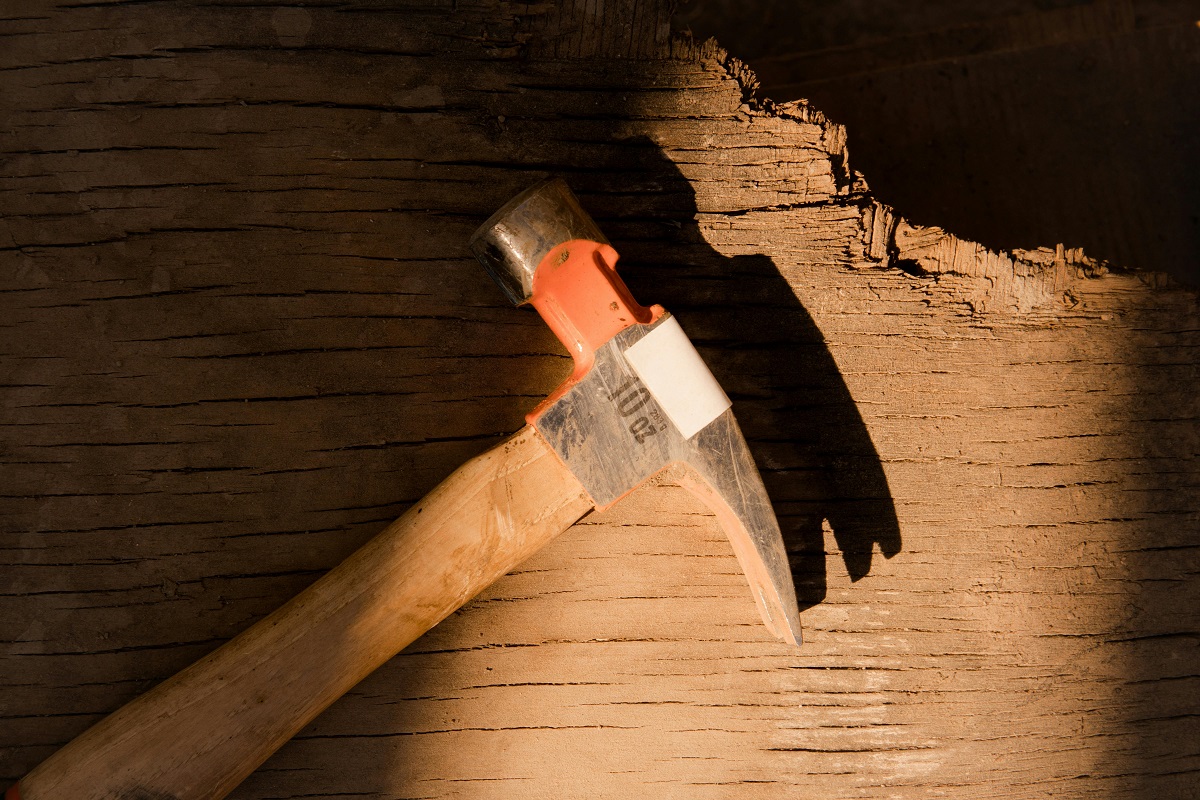 hammer on a wooden surface